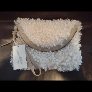Cream and tan Universal Thread faux fur clutch purse